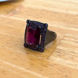Cute ring with purple stones